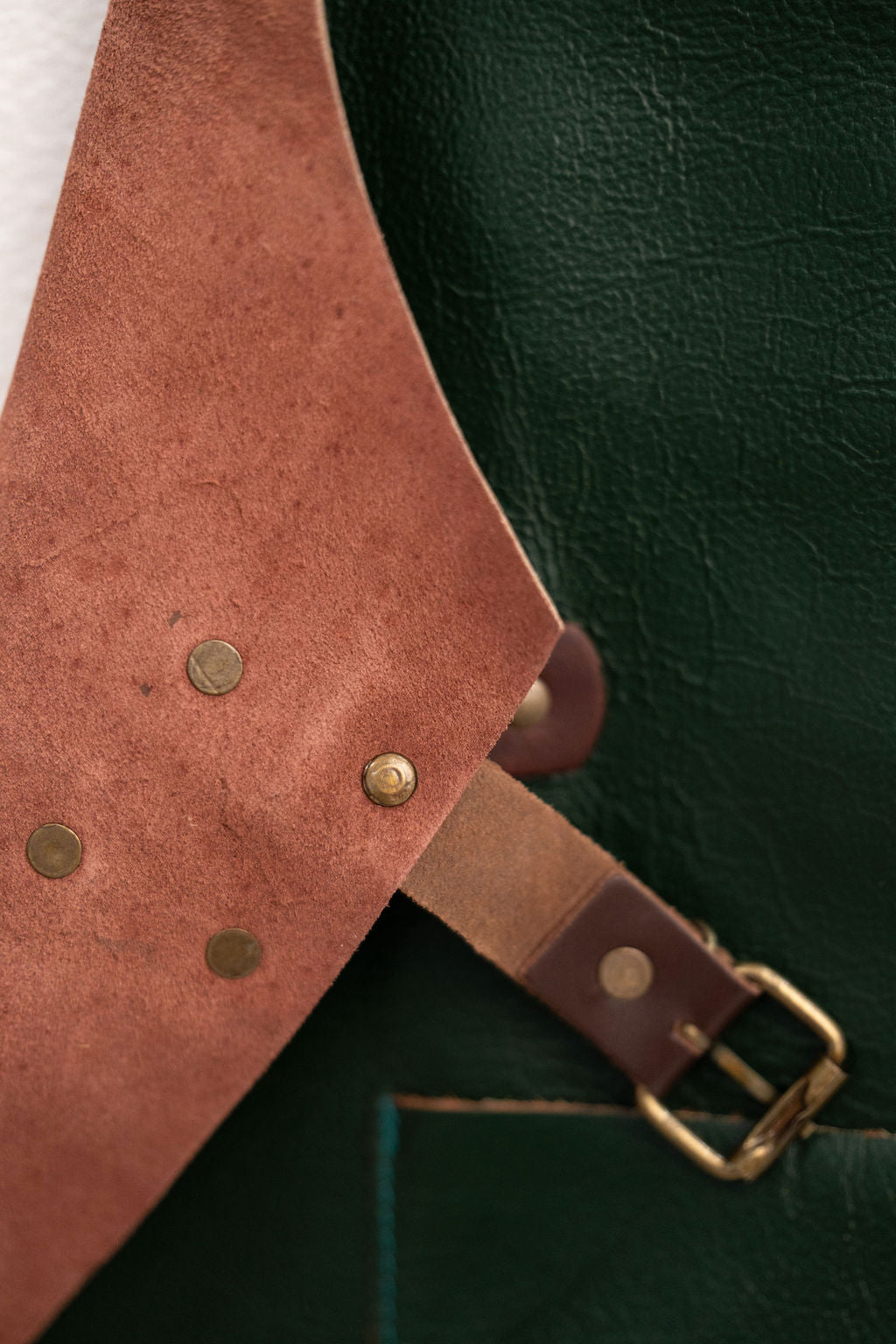 Premium green leather apron forest tone for creative workspace use