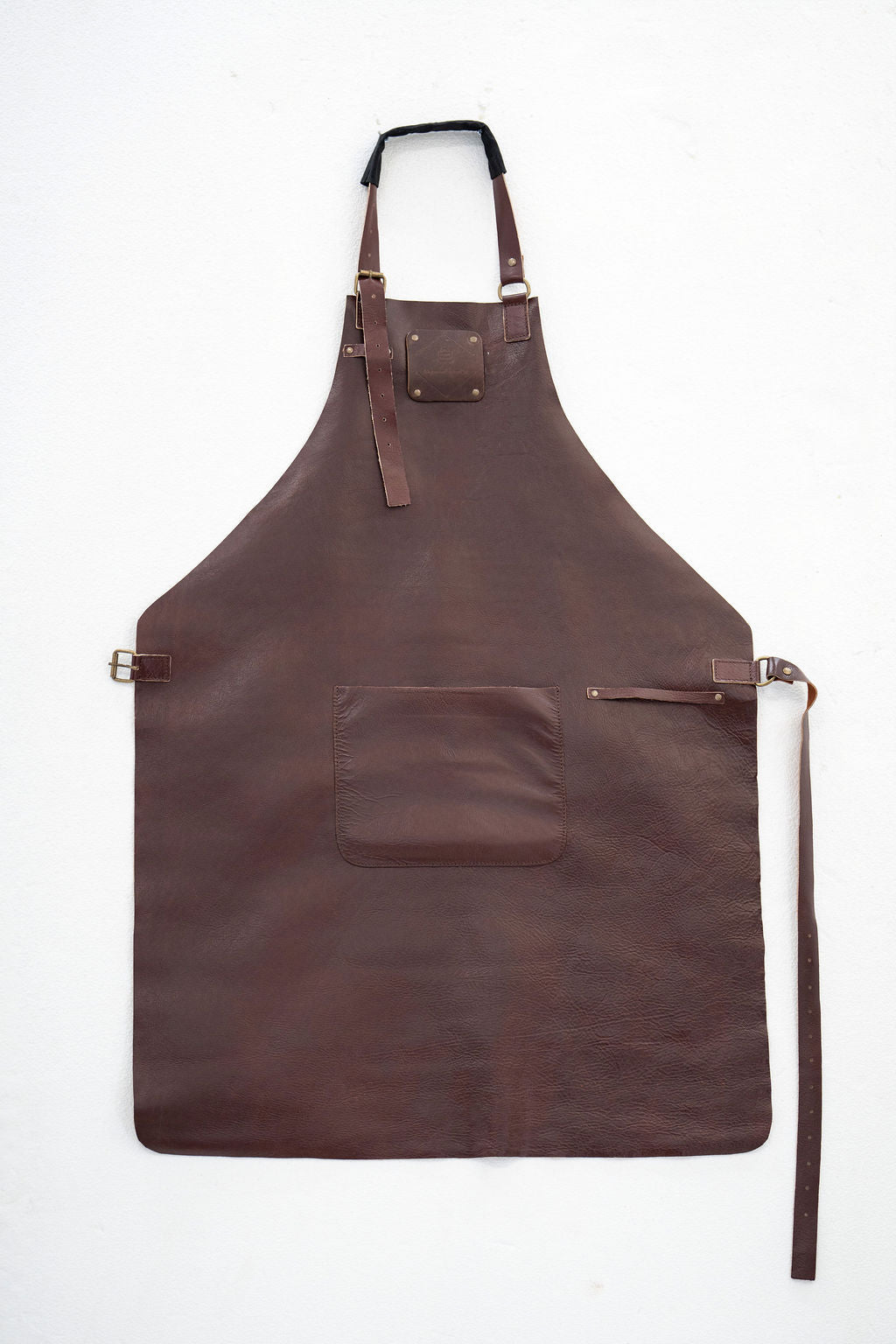 Stylish handmade chestnut leather apron for kitchen and workshop work