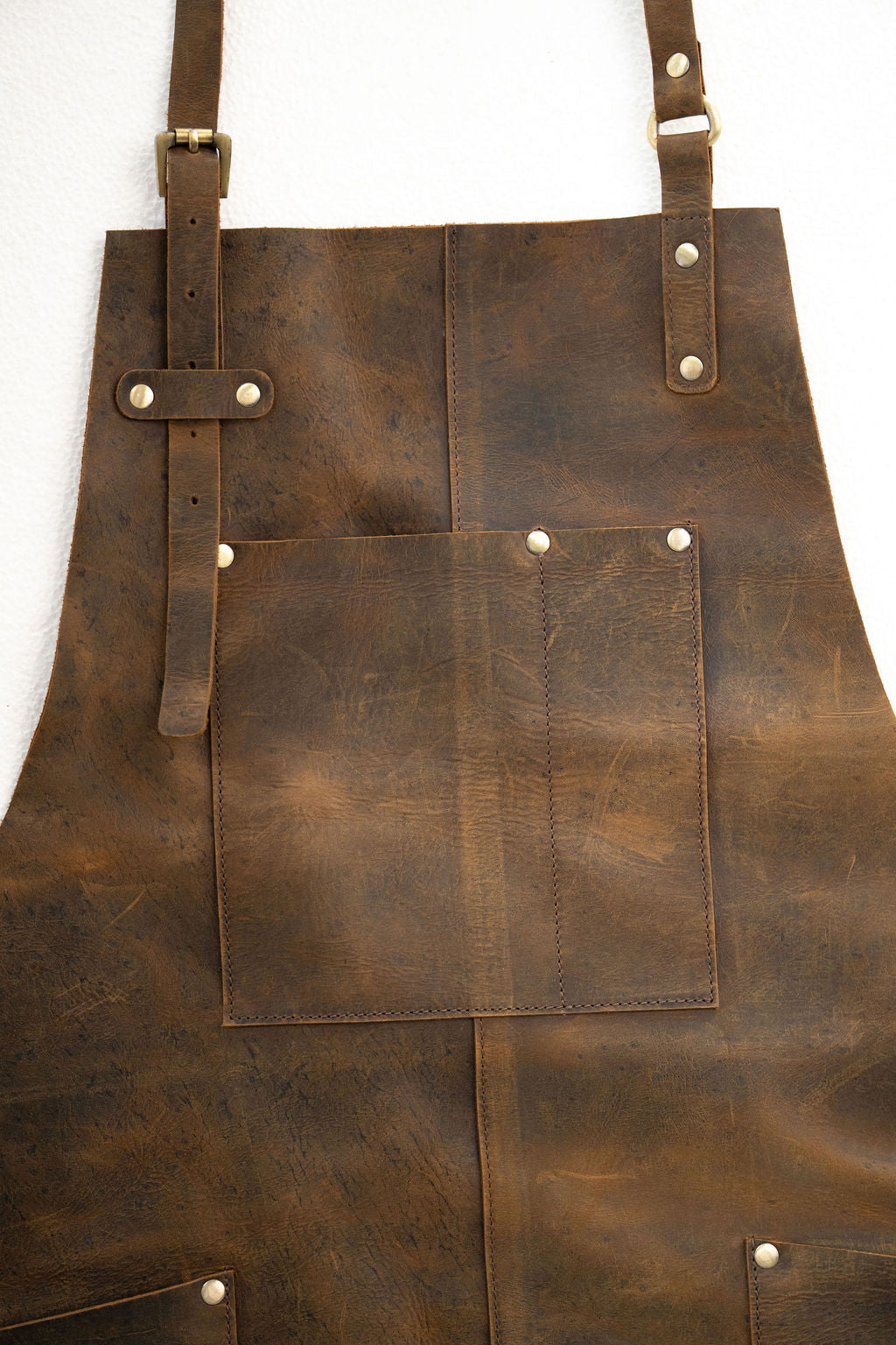 Stylish vintage brown leather apron for barbers and creative professionals