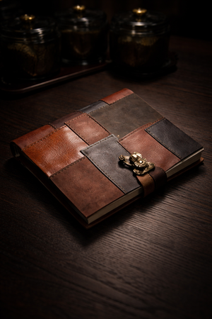 Luxury leather patchwork journal with vintage clasp, chic handcrafted travel notebook for stylish journaling