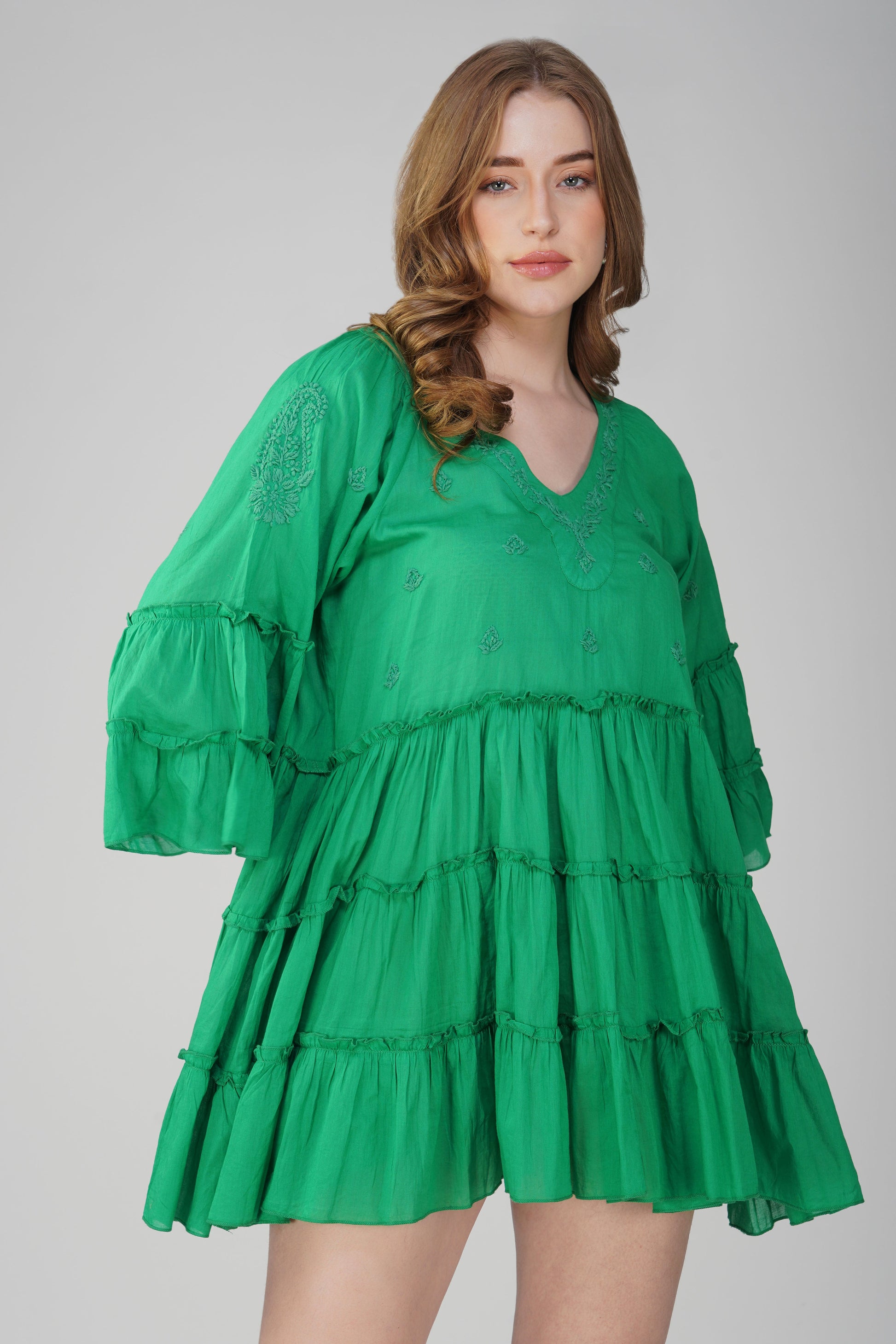 Boho style emerald green cotton mini dress with layered silhouette