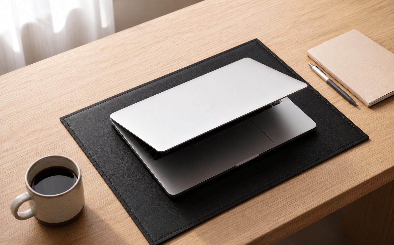 Elegant multi-purpose leather desk pad and table placemat in black