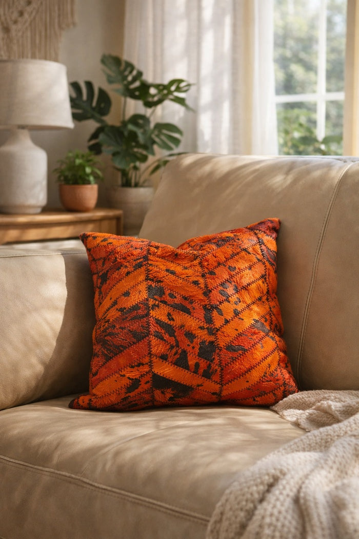 Premium orange black cowhide throw pillow cover with natural leather texture