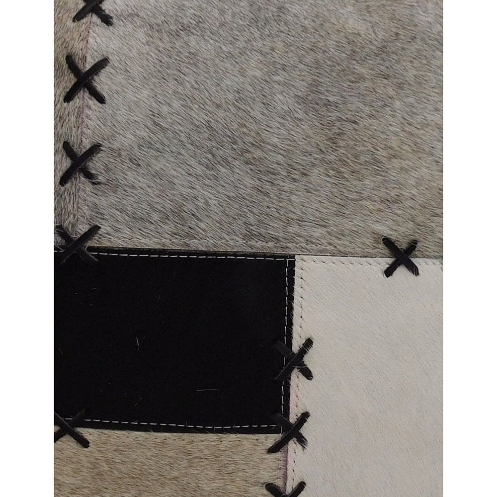 Black grey cream leather cowhide pillow cover styled in elegant glam living room