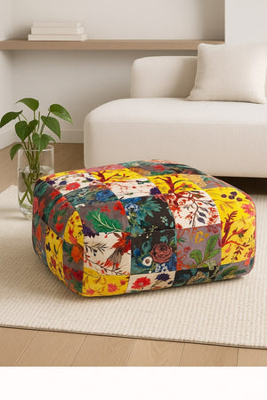 Boho floral velvet pouf styled in a cozy living room with warm neutral decor
