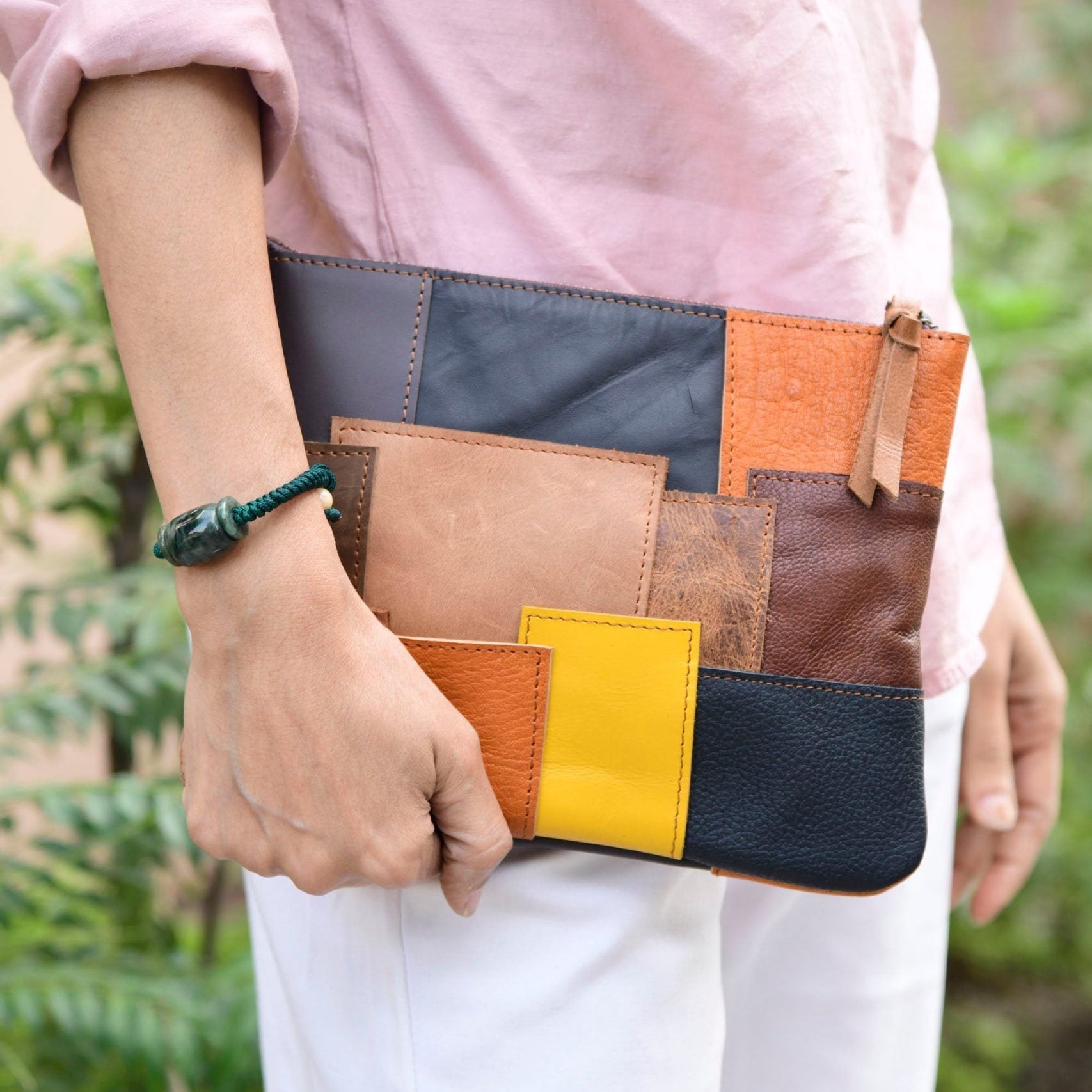 Genuine leather patchwork clutch
